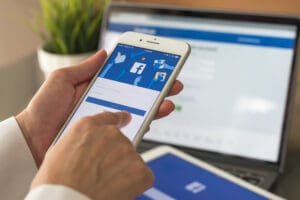 A person accessing Facebook
