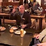 A man raising a hand